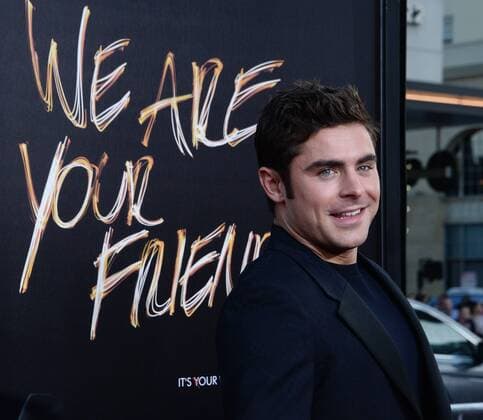 Cast member Zac Efron attends the premiere of the motion picture romantic drama We Are Your Friends at the TCL Chinese Theatre in the Hollywood section of Los Angeles on August 20, 2015. Storyline: Caught between a forbidden romance and the expectations of his friends, aspiring DJ Cole Carter attempts to find the path in life that leads to fame and fortune.  LAP2015082014 JIMxRUYMEN
