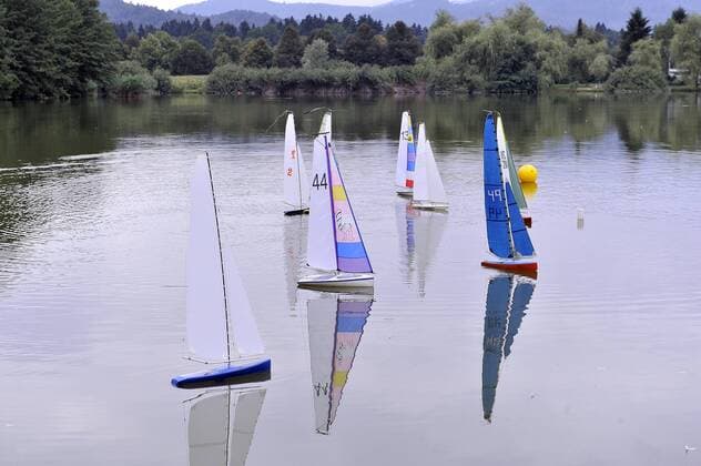 Modeling competition - Ljubljana, Slovenia 24.08.2015., Ljubljana, Slovenia - Modeling fans gathered at Kosesko lake for sailing competition.  BorutxZivulovic FAxBobo PIXSELL