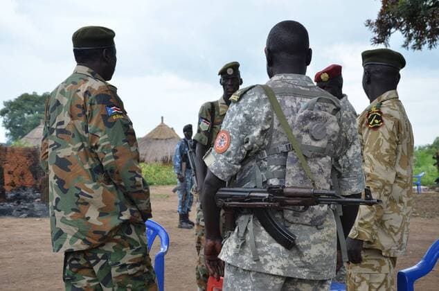 Aug 20, 2015 - Juba, South Sudan - SPLA Colonel PHILIP AGUER visits the area where the attack was carried out by an armed group on Pageri area is the work of terrorist and barbaric and inhuman because they targeted innocent citizens, where they burned the homes of citizens and during this attack the burning old man. Aguer said that when he speaking to reporters in Pageri area he added that Riek group says it is responsible for this attack and this mislead to the international media. Juba South Sudan - ZUMAb132