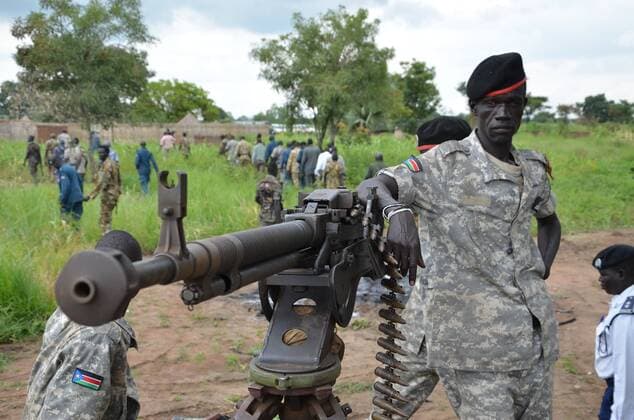 Aug 20, 2015 - Juba, South Sudan - SPLA Colonel PHILIP AGUER visits the area where the attack was carried out by an armed group on Pageri area is the work of terrorist and barbaric and inhuman because they targeted innocent citizens, where they burned the homes of citizens and during this attack the burning old man. Aguer said that when he speaking to reporters in Pageri area he added that Riek group says it is responsible for this attack and this mislead to the international media. Juba South Sudan - ZUMAb132