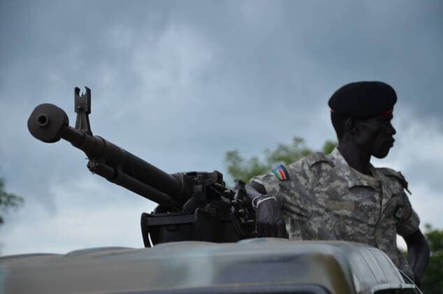 Aug 20, 2015 - Juba, South Sudan - SPLA Colonel PHILIP AGUER visits the area where the attack was carried out by an armed group on Pageri area is the work of terrorist and barbaric and inhuman because they targeted innocent citizens, where they burned the homes of citizens and during this attack the burning old man. Aguer said that when he speaking to reporters in Pageri area he added that Riek group says it is responsible for this attack and this mislead to the international media. Juba South Sudan - ZUMAb132