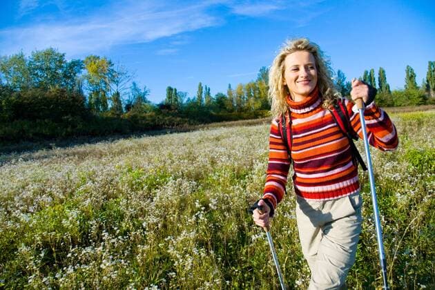 WELLNESS UND GESUNDHEIT Nordic Walking - Model release Woman on excursion.  1271239