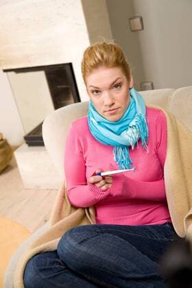 Woman being ill, treating herself at home.  1272332