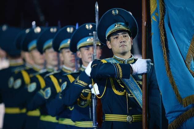(150907) -- MOSCOW, Sept. 7, 2015 -- Kazakhstan s guard of honor and the presidential regiment Aibyn band perform during the Spasskaya Tower International Military Music Festival in Moscow, Russia, on Sept. 7, 2015. Combined orchestra of all participants perform during the 8th International Military Music Festival Spasskaya Tower held here on Monday. ) RUSSIA-MOSCOW-MILITARY-BAND-FESTIVAL PavelxBednyakov 