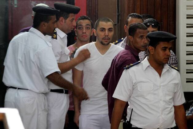 Sept. 8, 2015 - Cairo, Cairo, Egypt - Member of Egyptian Ultras of Zamalek attends his trial in a court in Cairo, on September 8, 2015. At least 22 soccer fans were crushed to death outside an air defense stadium in Cairo after police fired tear gas to break up the crowd waiting in a fenced, narrow corridor to watch. Police accused the fans of attacking the force, and rioting to enter the stadium. On Tuesday, March, 17, 2015 the chief prosecutor general also referred 16 fans to trial, accusing them of belonging to the Muslim Brotherhood Cairo Egypt - ZUMAap3_