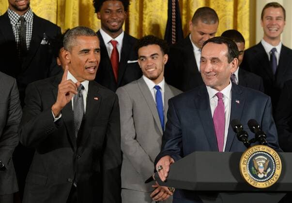 U.S. President Barack Obama makes a remark with Duke head basketball coach Mike Krzyzewski during a celebration event in the East Room of the White House in Washington, DC on September 8, 2015. The Duke Blue Devils won the NCAA college basketball championship in March of 2015.  WAP2015090803 PATxBENIC