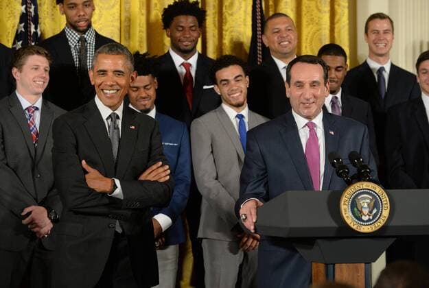 U.S. President Barack Obama shares a laugh with Duke head basketball coach Mike Krzyzewski during a celebration event in the East Room of the White House in Washington, DC on September 8, 2015. The Duke Blue Devils won the NCAA college basketball championship in March of 2015.  WAP2015090814 PATxBENIC