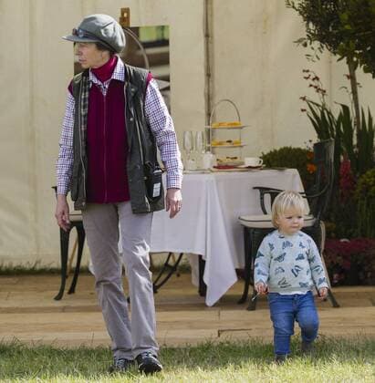 . 12 09 2015. Minchinhampton, United Kingdom. Whatley Manor International Horse Trials. Gatcombe Park. Princess Anne looks after her grand-daughter Mia .  xi-Imagesx IIM-11002-0009