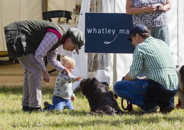 . 12 09 2015. Minchinhampton, United Kingdom. Whatley Manor International Horse Trials. Gatcombe Park. Princess Anne looks after her grand-daughter Mia .  xi-Imagesx IIM-11002-0013