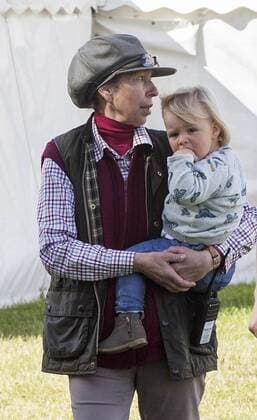 . 12 09 2015. Minchinhampton, United Kingdom. Whatley Manor International Horse Trials. Gatcombe Park. Princess Anne looks after her grand-daughter Mia .  xi-Imagesx IIM-11002-0015
