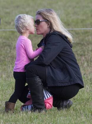 . 12 09 2015. Minchinhampton, United Kingdom. Whatley Manor International Horse Trials. Gatcombe Park. Autumn Phillips with her daughter Isla.  xi-Imagesx IIM-11002-0019