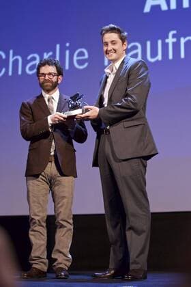 (150912) -- VENICE, Sept. 12, 2015 -- American directors Charlie Kaufman (L) and Duke Johnson pose with the Grand Jury Prize for their movie Anomalisa , during the award ceremony at the 72nd Venice Film Festival, at the Lido of Venice, Italy, Sept. 12, 2015. ) ITALY-VENICE-FILM-FESTIVAL-72ND-AWARD-GRAND JURY JinxYu 