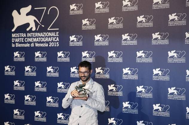 (150912) -- VENICE, Sept. 12, 2015 -- Director Gabriel Mascaro poses with the Special Orizzonti Jury Prize award for Neon Bull , as he attends the award winners photocall during the 72nd Venice Film Festival, at the Lido of Venice, Italy, Sept. 12, 2015. ) ITALY-VENICE-FILM-FESTIVAL-72ND-AWARD YexPingfan 