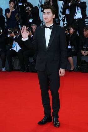 VENICE, ITALY - SEPTEMBER 12: Li Yifeng attends The Closing Ceremony Red Carpet during 72nd Venice Film Festival at Palazzo Del Cinema on September 12, 2015 in Venice, Italy. markxcape