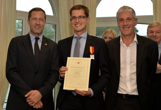 - NAMUR, BELGIUM: Walloon Minister President Paul Magnette, Sebastien Jodogne and Walloon Minister of Local Authorities, Cities, Housing and Energy Paul Furlan pictured during the award ceremony for the Merite Wallons by the Walloon Government at the Elysette, in Jambes, Namur, Thursday 17 September 2015.  ERICxLALMAND 04702127