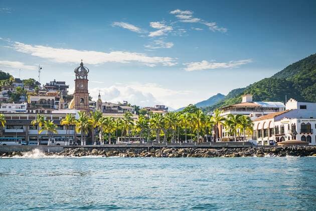 Mexico, Jalisco, Puerto Vallarta with Malecon and church Our Lady of Guadalupe, seen from sea  ABAF001897