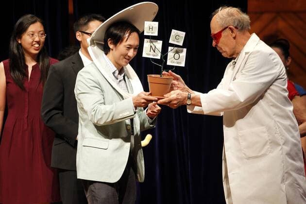 David Hu of Georgia Tech, accepts the 2015 Ig Nobel Prize in Physics from Nobel Laureate Dudley Herschbach (R) for testing the biological principle that nearly all mammals empty their bladders in about 21 seconds (plus or minus 3 seconds) at the awards ceremony at Harvard University in Cambridge, Massachusetts on September 17, 2015. The prizes which are awarded by the Annals of Improbable Research are intended to celebrate the unusual, honor the imaginative and spur people s interest in science, medicine, and technology.  BOS2015091703 MATTHEWxHEALEY