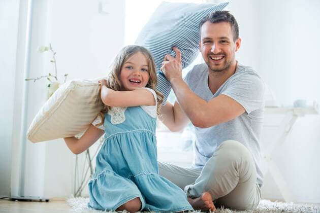 Father and daughter pillow fighting model released Symbolfoto property released  WESTF021554