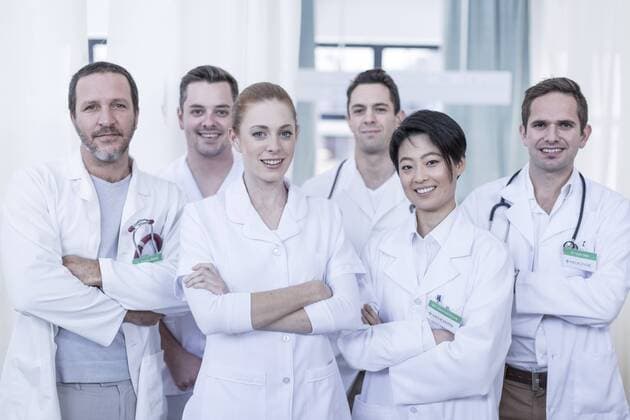 Portrait of confident hospital team model released Symbolfoto property released  ZEF006081