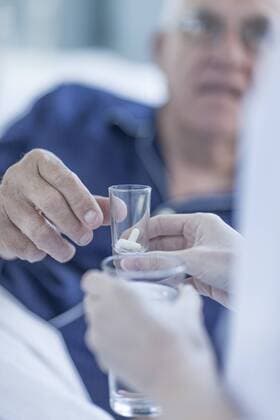 Hospital patient receiving medicine model released Symbolfoto property released  ZEF006550