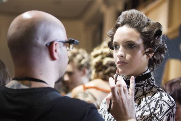 London, UK. 18 09 2015. Models get ready in make-up backstage for the fashion show. DAKS fashion show during London Fashion Week. London Fashion Week, DAKS, London, UK 