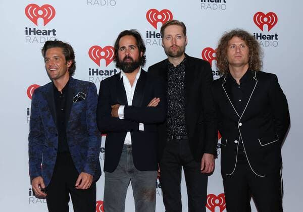 Brandon Flowers, Ronnie Vannucci Jr., Mark Stoermer and Dave Keuning of The Killers arrive in the press room for the iHeartRadio Music Festival at the MGM Grand Hotel in Las Vegas, Nevada on September 18, 2015.  LAV20150918085 JAMESxATOA