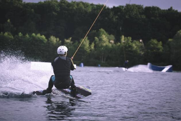 Back view of young man wakeboarding model released Symbolfoto property released  MADF000505