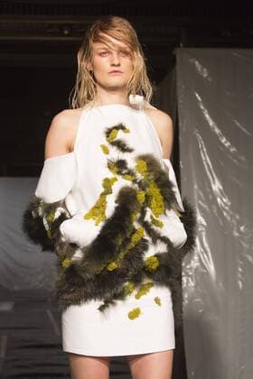 London, UK. 19 09 2015. Runway show of designer James Kelly at Fashion Scout during London Fashion Week. The designs feature moss and fine feathers. London Fashion Week, James Kelly at Fashion Scout, London, UK 