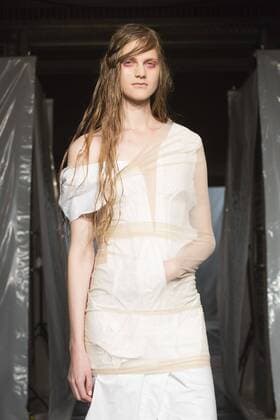 London, UK. 19 09 2015. Runway show of designer James Kelly at Fashion Scout during London Fashion Week. The designs feature moss and fine feathers. London Fashion Week, James Kelly at Fashion Scout, London, UK 