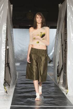 London, UK. 19 09 2015. Runway show of designer James Kelly at Fashion Scout during London Fashion Week. The designs feature moss and fine feathers. London Fashion Week, James Kelly at Fashion Scout, London, UK 