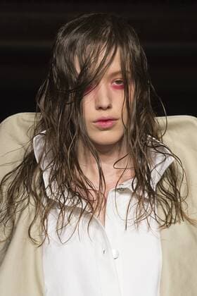 London, UK. 19 09 2015. Runway show of designer James Kelly at Fashion Scout during London Fashion Week. The designs feature moss and fine feathers. London Fashion Week, James Kelly at Fashion Scout, London, UK 