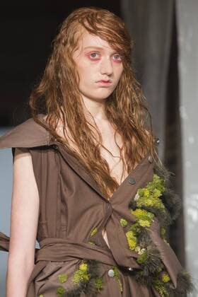 London, UK. 19 09 2015. Runway show of designer James Kelly at Fashion Scout during London Fashion Week. The designs feature moss and fine feathers. London Fashion Week, James Kelly at Fashion Scout, London, UK 