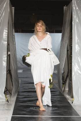 London, UK. 19 09 2015. Runway show of designer James Kelly at Fashion Scout during London Fashion Week. The designs feature moss and fine feathers. London Fashion Week, James Kelly at Fashion Scout, London, UK 
