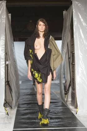 London, UK. 19 09 2015. Runway show of designer James Kelly at Fashion Scout during London Fashion Week. The designs feature moss and fine feathers. London Fashion Week, James Kelly at Fashion Scout, London, UK 