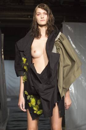 London, UK. 19 09 2015. Runway show of designer James Kelly at Fashion Scout during London Fashion Week. The designs feature moss and fine feathers. London Fashion Week, James Kelly at Fashion Scout, London, UK 