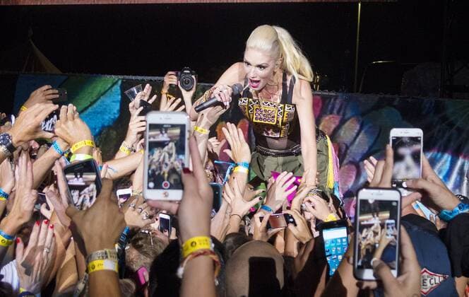 Sept. 18, 2015 - San Diego, CA, USA - September 18, 2015 - San Diego, California, USA - Fans use their cell phones to record Gwen Stefani of the band No Doubt as the band headlined day one of the Kaaboo Festival at the Del Mar Fairgrounds. San Diego USA - ZUMAa97_