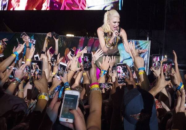 Sept. 18, 2015 - San Diego, CA, USA - September 18, 2015 - San Diego, California, USA - Fans use their cell phones to record Gwen Stefani of the band No Doubt as the band headlined day one of the Kaaboo Festival at the Del Mar Fairgrounds. San Diego USA - ZUMAa97_