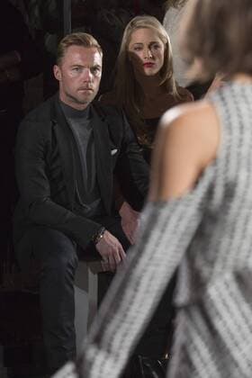 London, UK. 20 09 2015. Ronan Keating and his new wife Storm Keating (formerly Storm Uechtritz) attend the London Fashion Week SS16 ready-to-wear runway show of label Pringle of Scotland at the St Pancras Renaissance Hotel. London Fashion Week, Pringle of Scotland, London, UK 