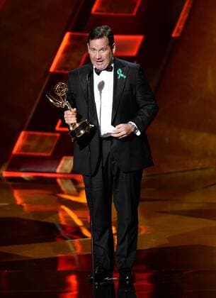 Game of Thrones director David Nutter accepts an award onstage during the 67th Primetime Emmy Awards in the Microsoft Theater in Los Angeles on September 20, 2015.  LAP20150920843 KENxMATSUI