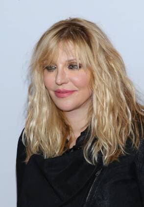 Courtney Love arrives in the press room for the iHeartRadio Music Festival at the MGM Grand Hotel in Las Vegas, Nevada on September 18, 2015.  LAV20150918106 JAMESxATOA