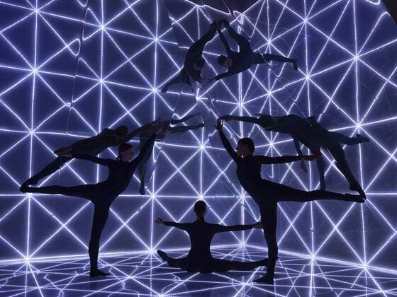 London, UK. 22 09 2015. Three dancers perform at the London Fashion Week runway show of British accessories and handbag designer Anya Hindmarch at Lindley Hall. London Fashion Week, Anya Hindmarch, London, UK 