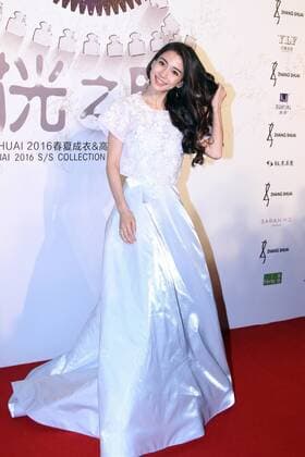 BEIJING, CHINA - SEPTEMBER 22: (CHINA OUT) Actress Angelababy poses on the red carpet during the Zhang Shuai 2016 S S Collection & Haute Couture at National Agricultural Exhibition Center on September 22, 2015 in Beijing, China.  CFP473290402