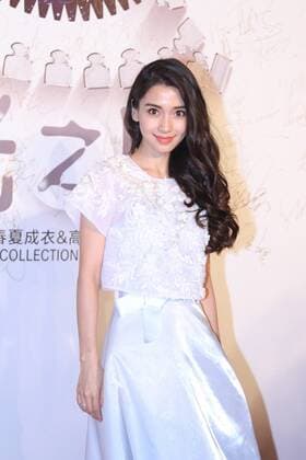 BEIJING, CHINA - SEPTEMBER 22: (CHINA OUT) Actress Angelababy poses on the red carpet during the Zhang Shuai 2016 S S Collection & Haute Couture at National Agricultural Exhibition Center on September 22, 2015 in Beijing, China.  CFP473290403