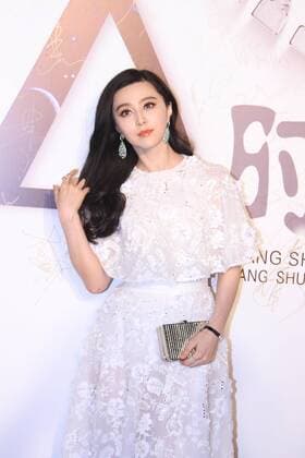 BEIJING, CHINA - SEPTEMBER 22: (CHINA OUT) Actress Fan Bingbing poses on the red carpet during the Zhang Shuai 2016 S S Collection & Haute Couture at National Agricultural Exhibition Center on September 22, 2015 in Beijing, China.  CFP473291353
