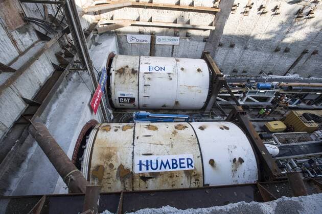 Sept. 24, 2015 - Toronto, ON, Canada - TORONTO, ON - SEPTEMBER 24 - Two large boring machines sit at the point on Eglinton Ave. East, where they will soon begin boring toward Yonge St. The Crosstown is a light rail transit (LRT) line that will run across Eglinton Avenue between Mount Dennis (Weston Road) and Kennedy Station. This 19-kilometre corridor will include a 10-kilometre underground portion, between Keele Street and Laird Drive. September 24, 2015. Toronto Canada  - ZUMAt14_