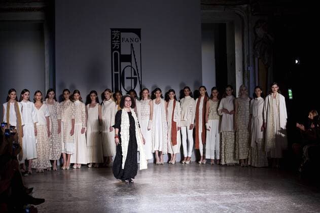 MILAN, Sept. 25, 2015 -- Chinese designer Xiaoyan Li (front) meets the audience after her fashion show in Milan, Italy, Sept. 25, 2015. ) ITALY-MILAN-FASHION-CHINA-XIAOYAN LI JinxYu 