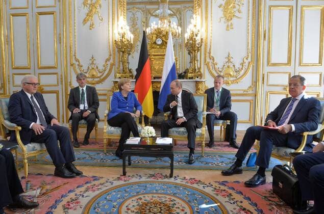 PARIS, FRANCE. OCTOBER 2, 2015. German Chancellor Angela Merkel (3rd L) and Russian President Vladimir Putin (3rd R) hold a bilateral meeting ahead of Ukraine peace talks at the Elysee Palace in Paris. Pictured L is Germany s Foreign Minister Frank-Walter Steinmeier and R is Russia s Foreign Minister Sergei Lavrov. Alexei Druzhinin Russian Presidential Press and Information Office TASS  TS00EE82