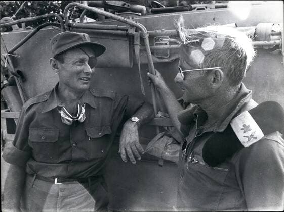 1973 - Yom Kippur War 1973 Moshe Dayan talking to an Israeli General Adnan at the Siuoi front. - ZUMAk09_