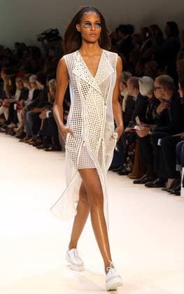 A model takes to the catwalk during the presentation of Akris collection as part of the 2016 Spring-Summer ready-to-wear Fashion Week in Paris, on October 4, 2015.  PAR20151004115 MAYAxVIDON-WHITE
