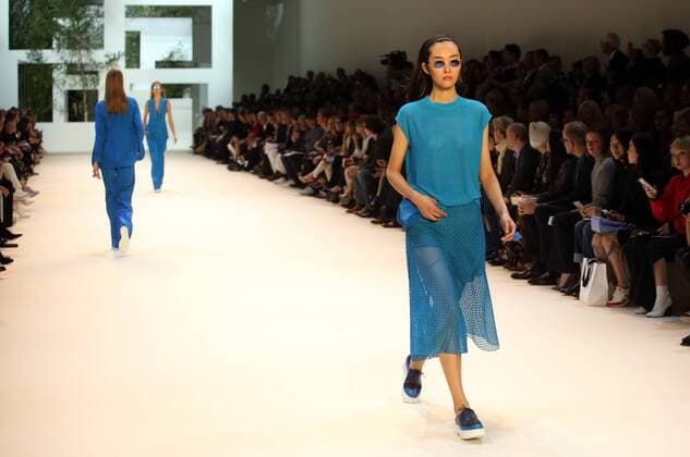 A model takes to the catwalk during the presentation of Akris collection as part of the 2016 Spring-Summer ready-to-wear Fashion Week in Paris, on October 4, 2015.  PAR20151004107 MAYAxVIDON-WHITE